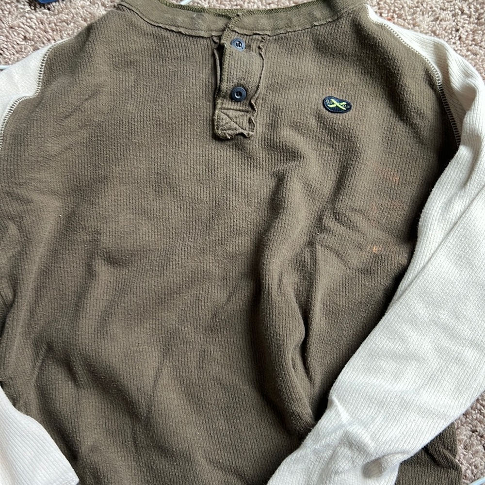 Fits more like a small to a medium